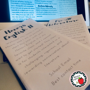 White Syllabus Brochures for a High school English Class Resting on a silver Apple laptop 