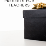 Black-wrapped package with golden bow appears under text that reads: 10 Essential Gifts for the Teacher in Your Life #mooreenglish @moore-english.com