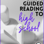 A wooden modeling art doll beside black lettering about guided reading and high school
