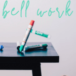 Dry erase markers fall on a black bar stool under orange and green letters tha read: The Best Bell Work