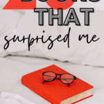 A red book sits atop a white bed. The image appears under text that reads: 20 Books that Surprised Me